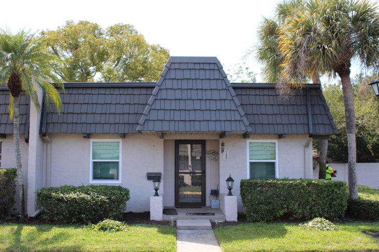 Florida home with new impact windows and entry door installed by Storm Pro