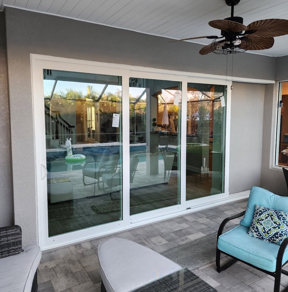 Hurricane-rated sliding glass doors installed by Storm Pro for door replacement in Lee County
