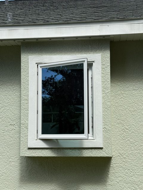 Casement impact window, partly open