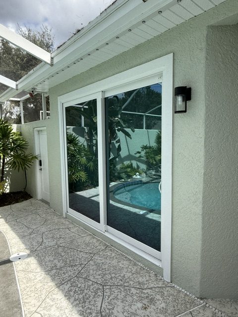 Hurricane impact door: impact sliding glass doors to a screened pool