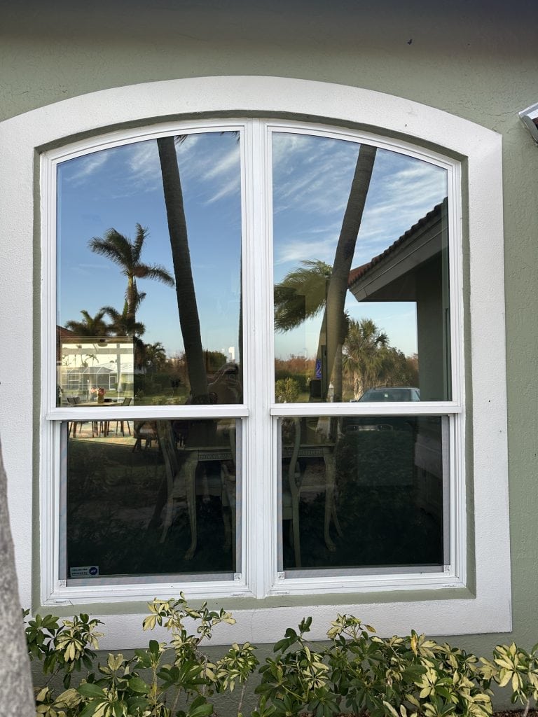 Advantages of hurricane windows: arched double hung impact windows