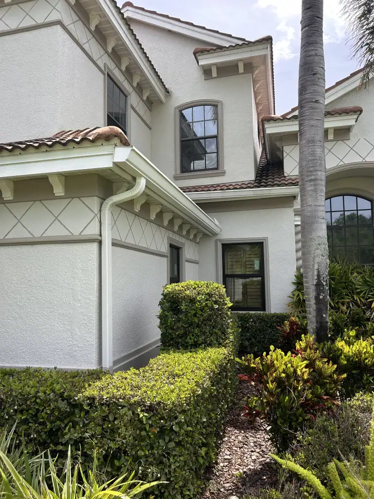 Impact windows installed on a two-story Florida home