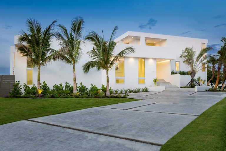 Modern Florida home with PGT WinGuard impact casement, awning and picture windows