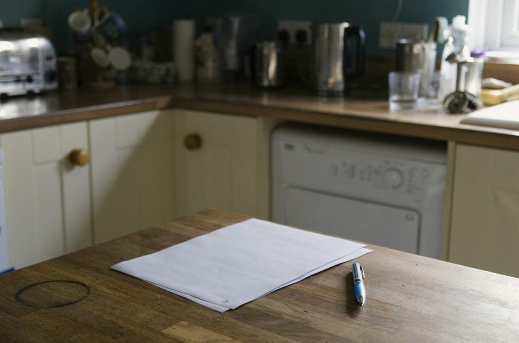 Permit and product approval paperwork kept for an impact window warranty claim